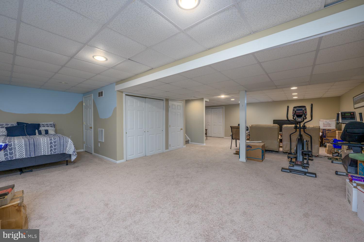 24 Hogan Way Moorestown, NJ 08057 - Photo 15 of 15 a view of a livingroom with furniture and a gym