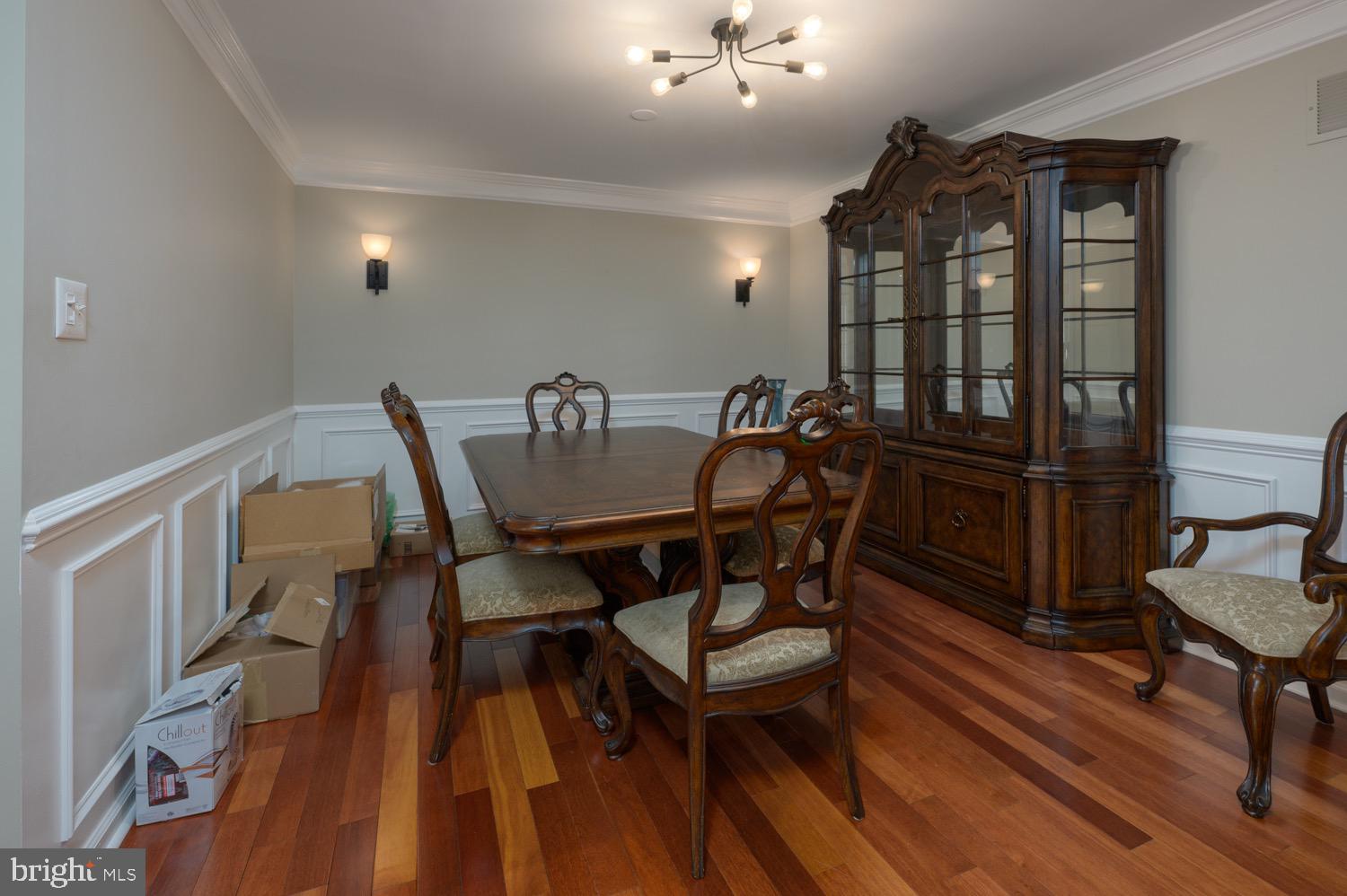 24 Hogan Way Moorestown, NJ 08057 - Photo 4 of 15 a view of a dining room with furniture and wooden floor
