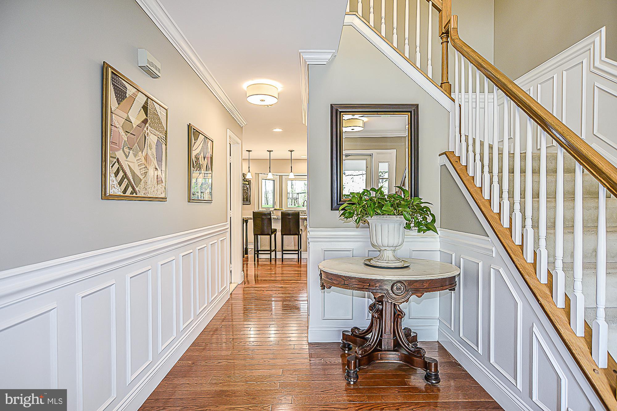 9291 Davis Drive Lorton, VA 22079 - Photo 3 of 57 Foyer with elegant custom molding and shadowboxing