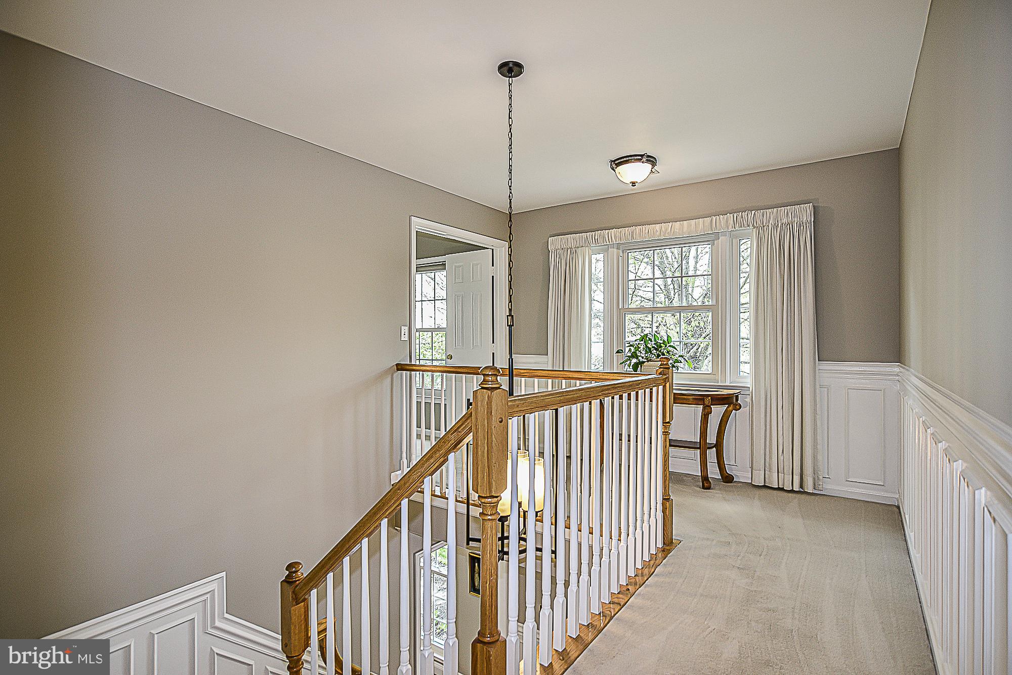 9291 Davis Drive Lorton, VA 22079 - Photo 23 of 57 Shadowbox molding flows into the upper hall