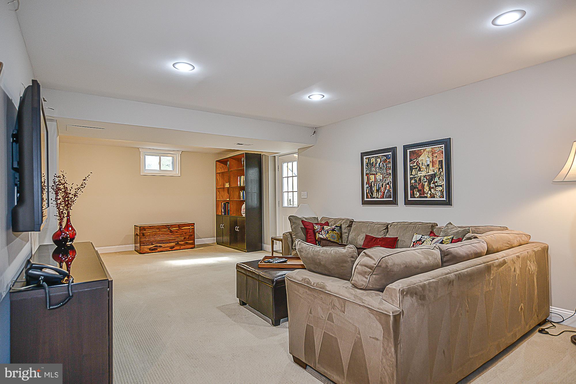 9291 Davis Drive Lorton, VA 22079 - Photo 34 of 57 Spacious rec room in walkup finished basement