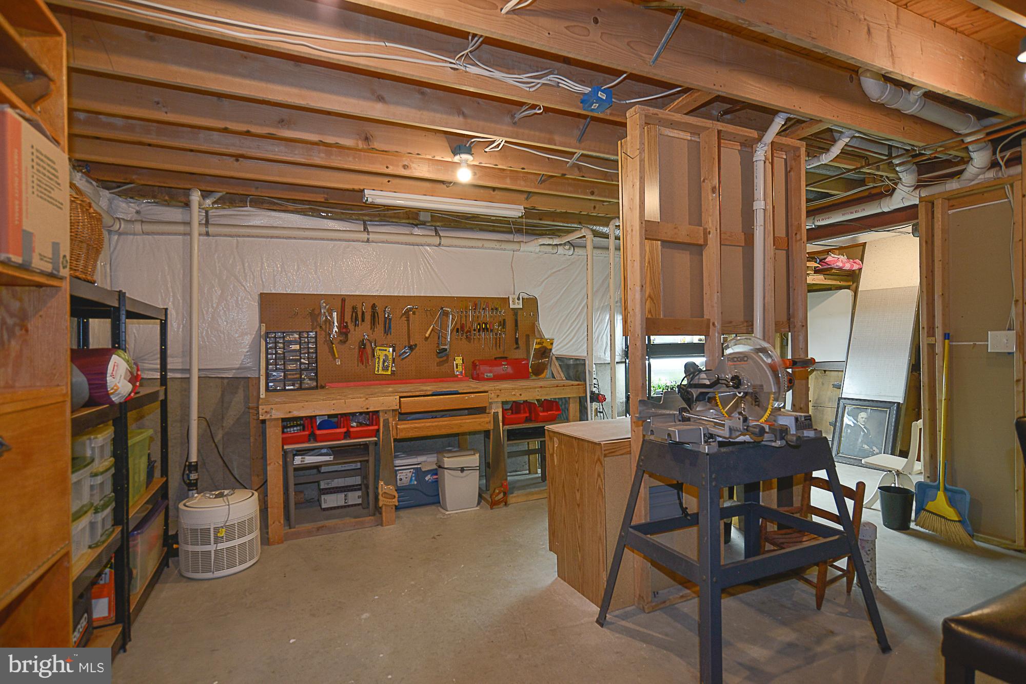9291 Davis Drive Lorton, VA 22079 - Photo 39 of 57 Workshop and storage room