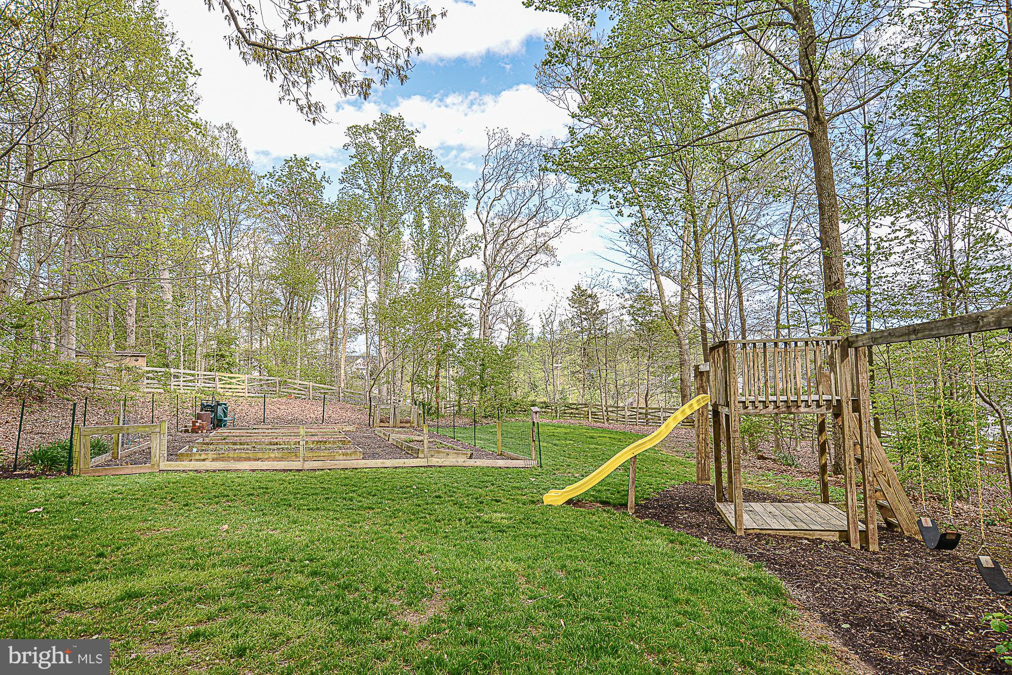 9291 Davis Drive Lorton, VA 22079 - Photo 48 of 57 Playset conveys. Lovely vegetable garden