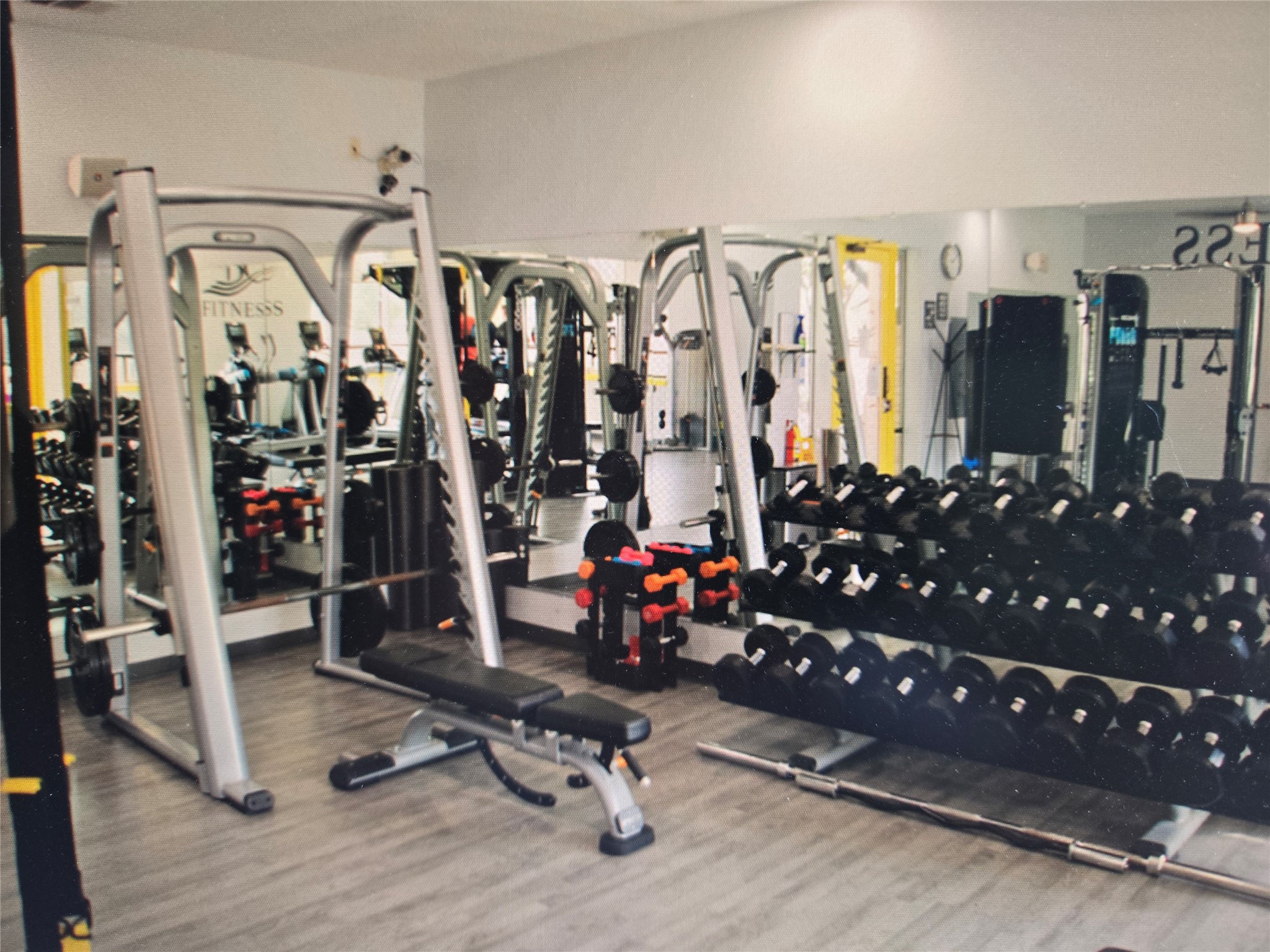 30013 Edgewood Drive Georgetown, TX 78628 - Photo 36 of 39 Sports and Golf memberships include access to the Fitness center, featuring a variety of exercise equipment including a weight rack, dumbbells, and a weight bench. Professional trainers on-site.