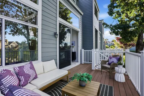 a view of a two chairs in the roof deck