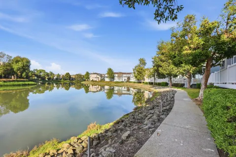a view of a lake with a yard