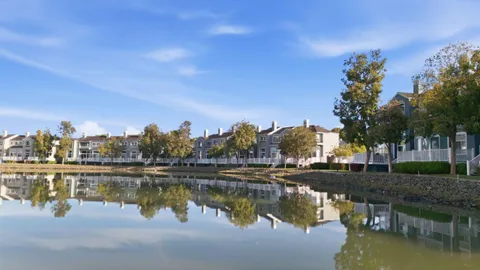 a view of a lake with a house
