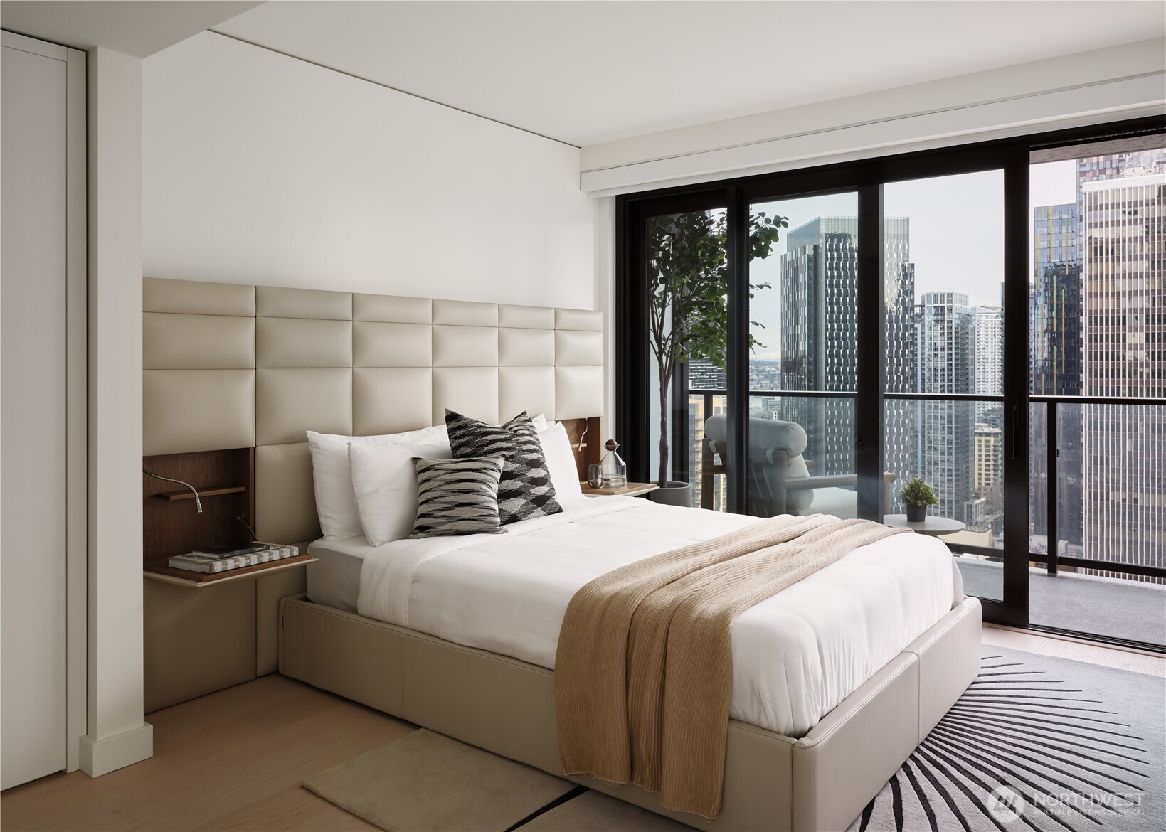 300 Virginia Street, Unit 1706 Seattle, WA 98101 - Photo 9 of 11 a bedroom with a bed and a large window