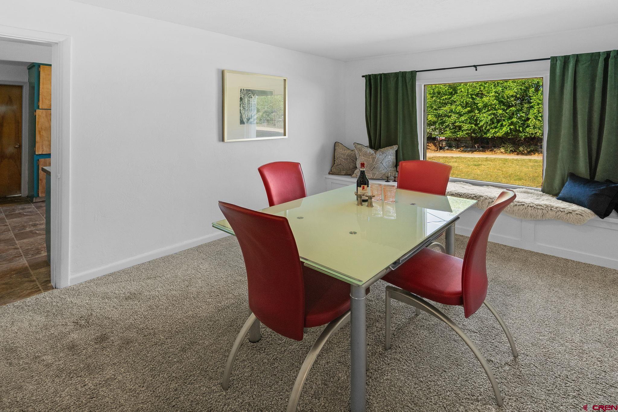 554 Main Street Nucla, CO 81424 - Photo 28 of 44 a view of a dining room with furniture window and outside view