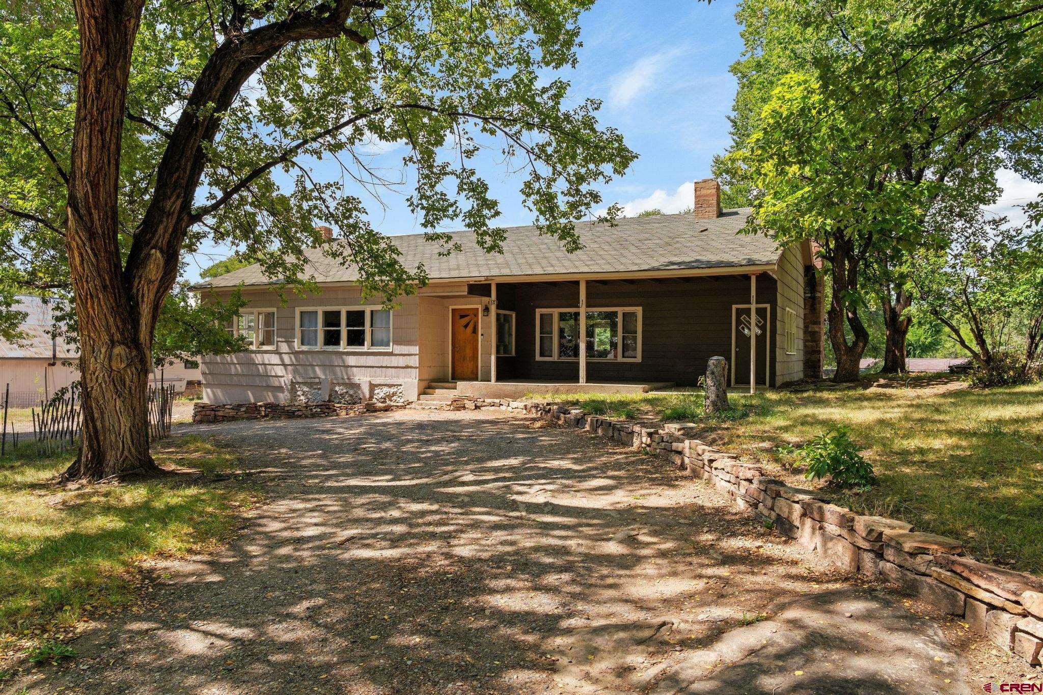 554 Main Street Nucla, CO 81424 - Photo 35 of 41 a front view of a house with a tree
