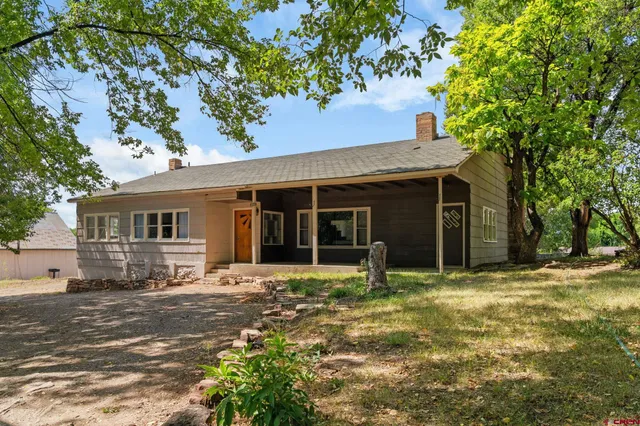 a house with yard in front of it