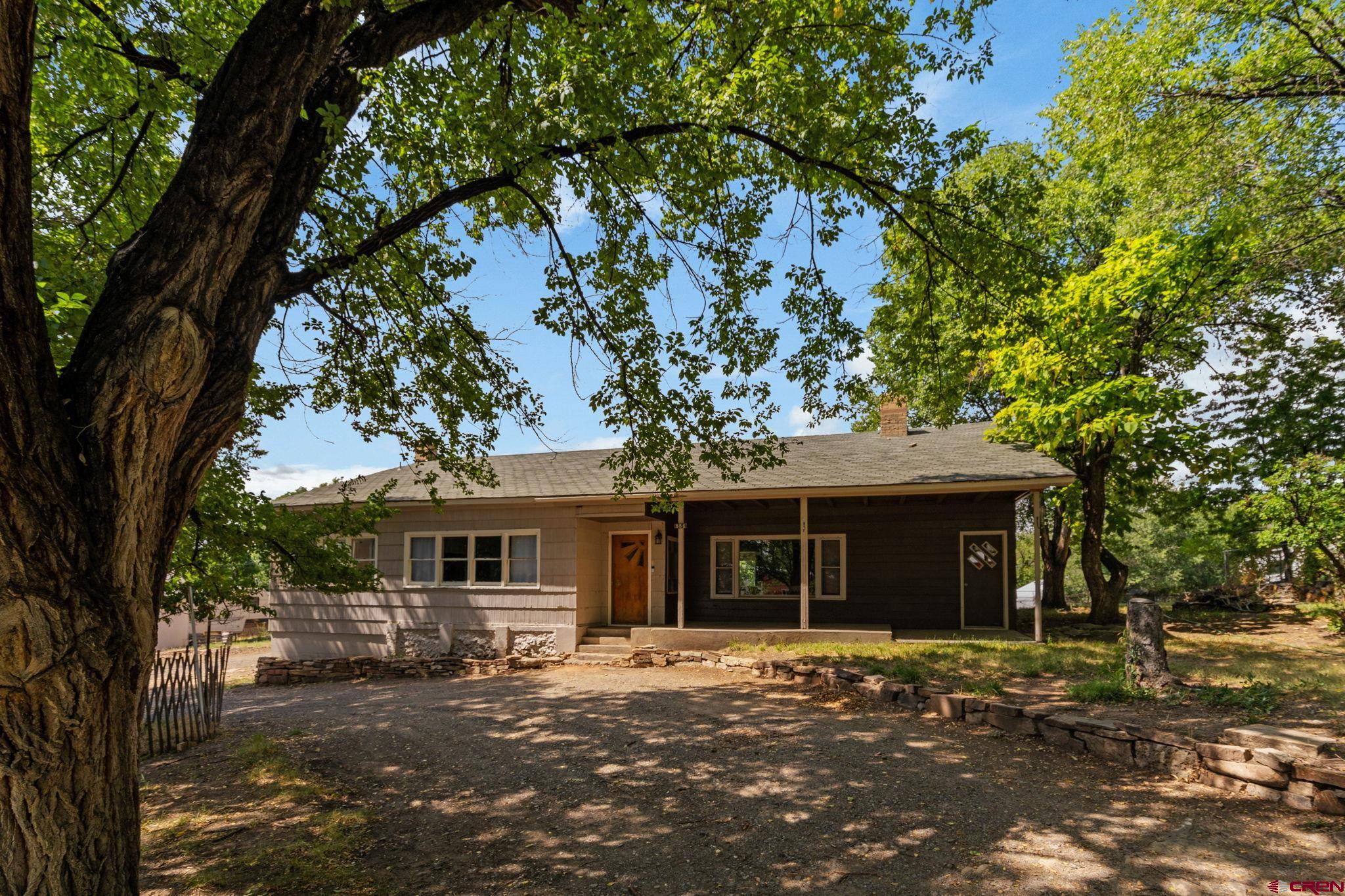 554 Main Street Nucla, CO 81424 - Photo 42 of 44 a front view of a house with a garden