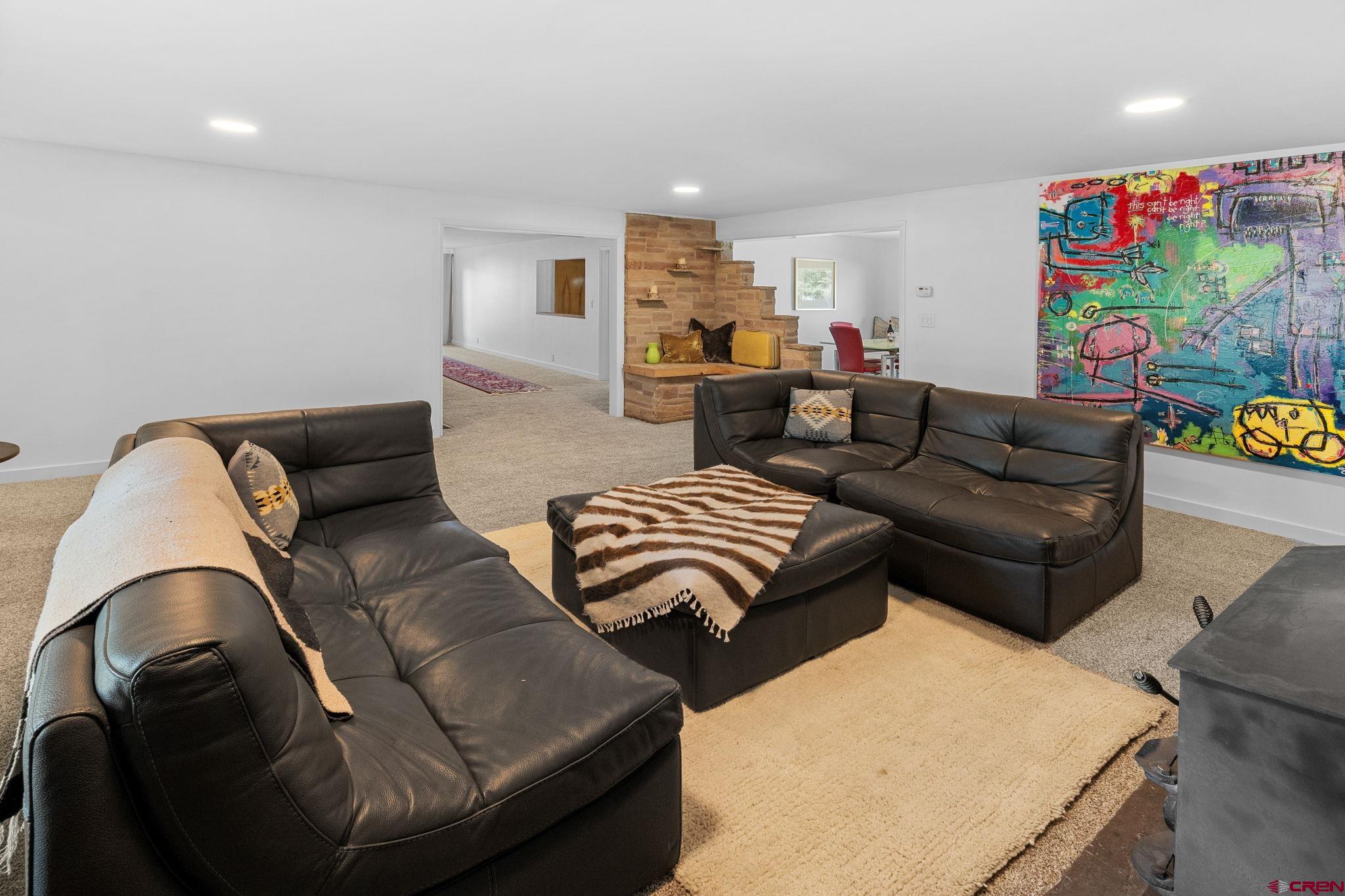554 Main Street Nucla, CO 81424 - Photo 9 of 41 a living room with furniture and a couch