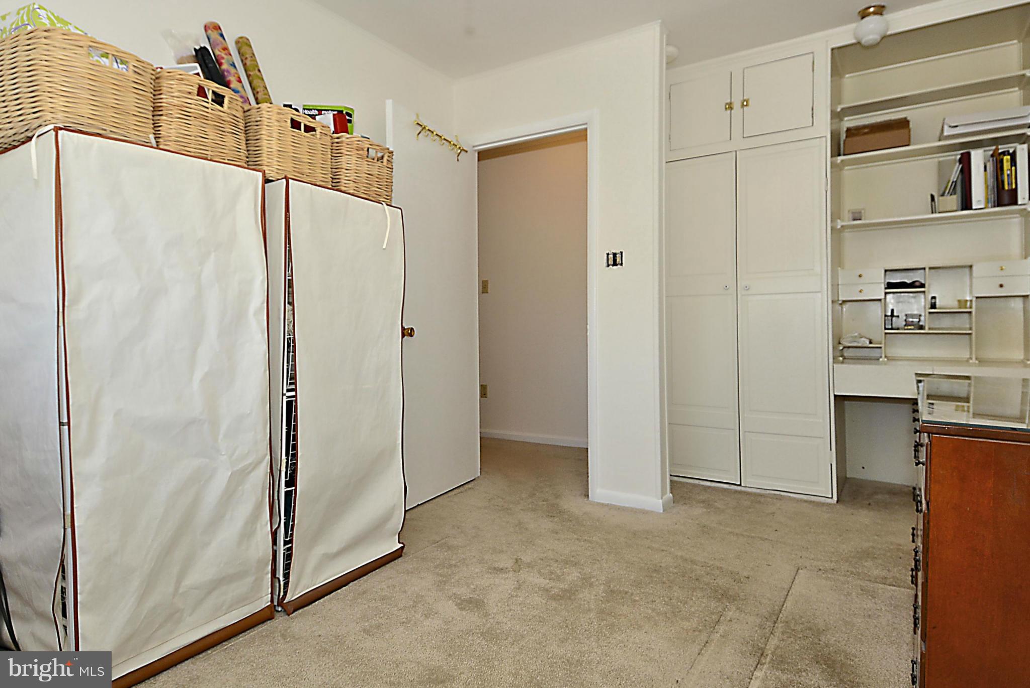 18506 Cabin Road Triangle, VA 22172 - Photo 21 of 30 Fourth Bedroom with Custom Built In Shelving