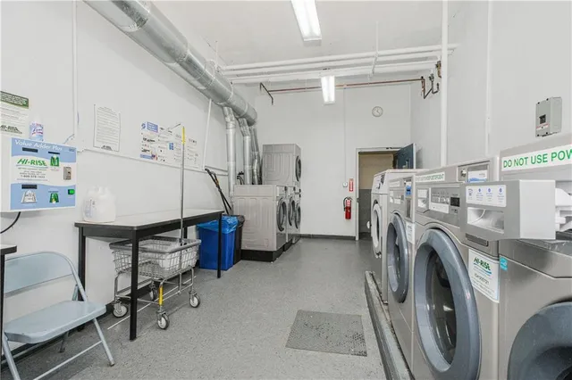 a view of livingroom with washer and dryer