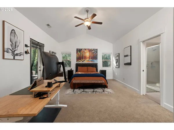 a bedroom with furniture and window