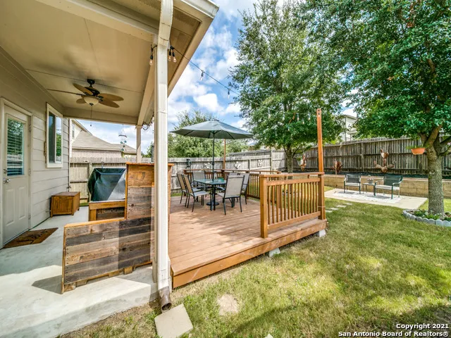 a view of a backyard with a patio