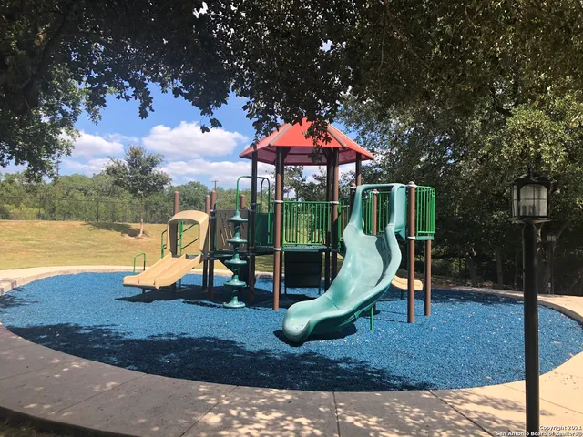 a view of a golf course with a play ground