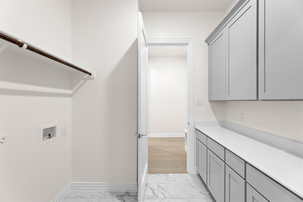 325 Slimp Bluff Azle, TX 76020 - Photo 21 of 25 a kitchen with a sink and cabinets