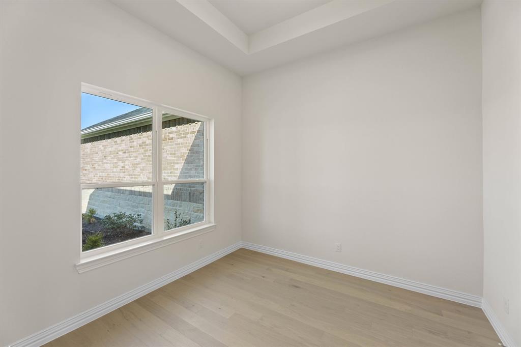 325 Slimp Bluff Azle, TX 76020 - Photo 3 of 25 an empty room with a window