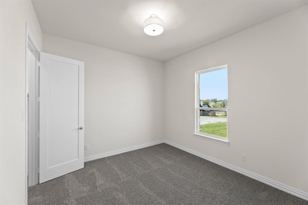 325 Slimp Bluff Azle, TX 76020 - Photo 6 of 25 an empty room with windows