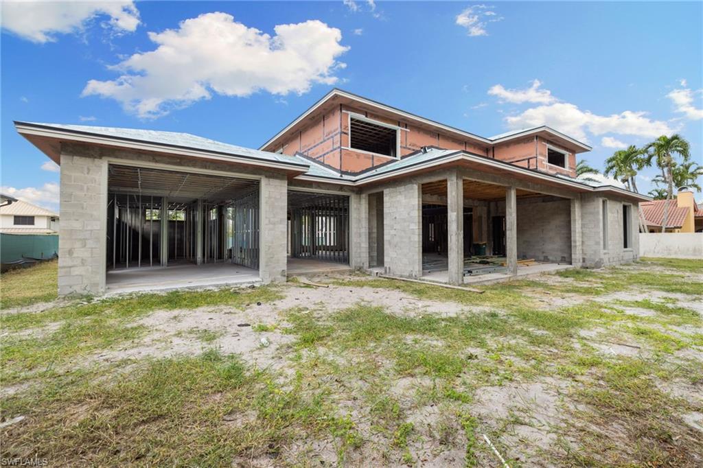 707 Buttonbush Lane Naples, FL 34108 - Photo 14 of 36 View of Backyard/Pool area