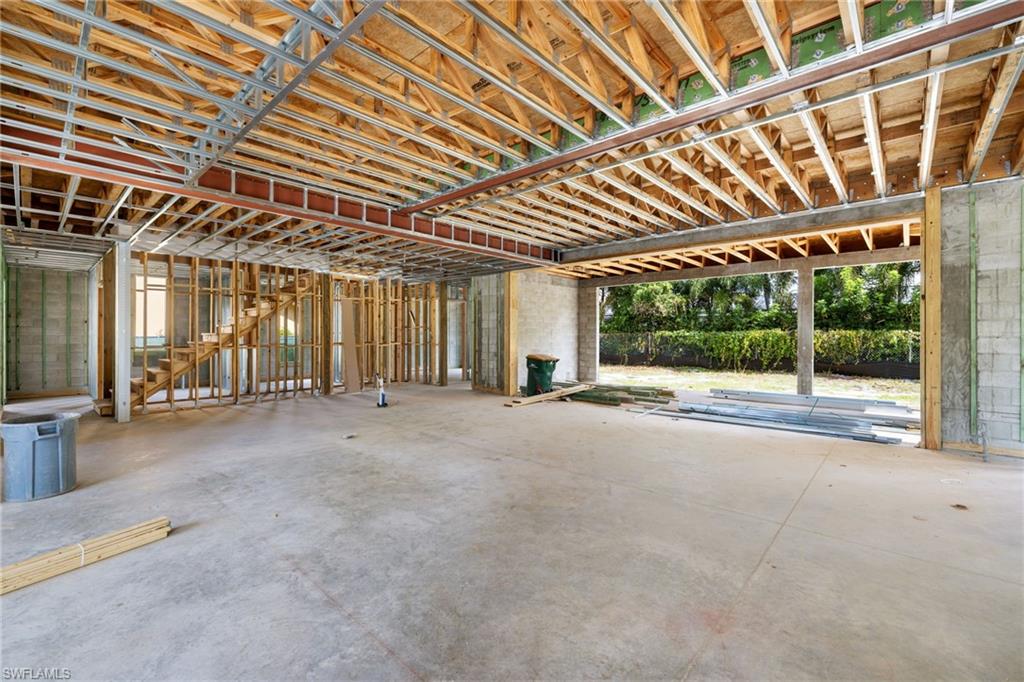 707 Buttonbush Lane Naples, FL 34108 - Photo 18 of 36 View facing Great Room, Kitchen and Outdoor Living