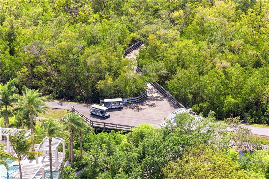 707 Buttonbush Lane Naples, FL 34108 - Photo 25 of 36 Boardwalk to the beach: walk or trolley