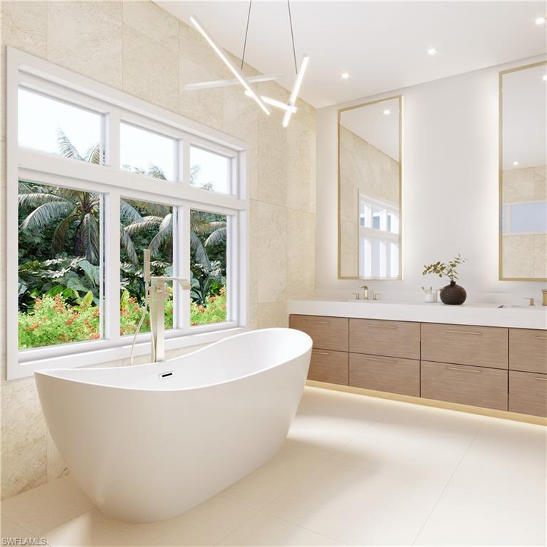 707 Buttonbush Lane Naples, FL 34108 - Photo 8 of 36 Master Bath with double vanity, separate tub and shower