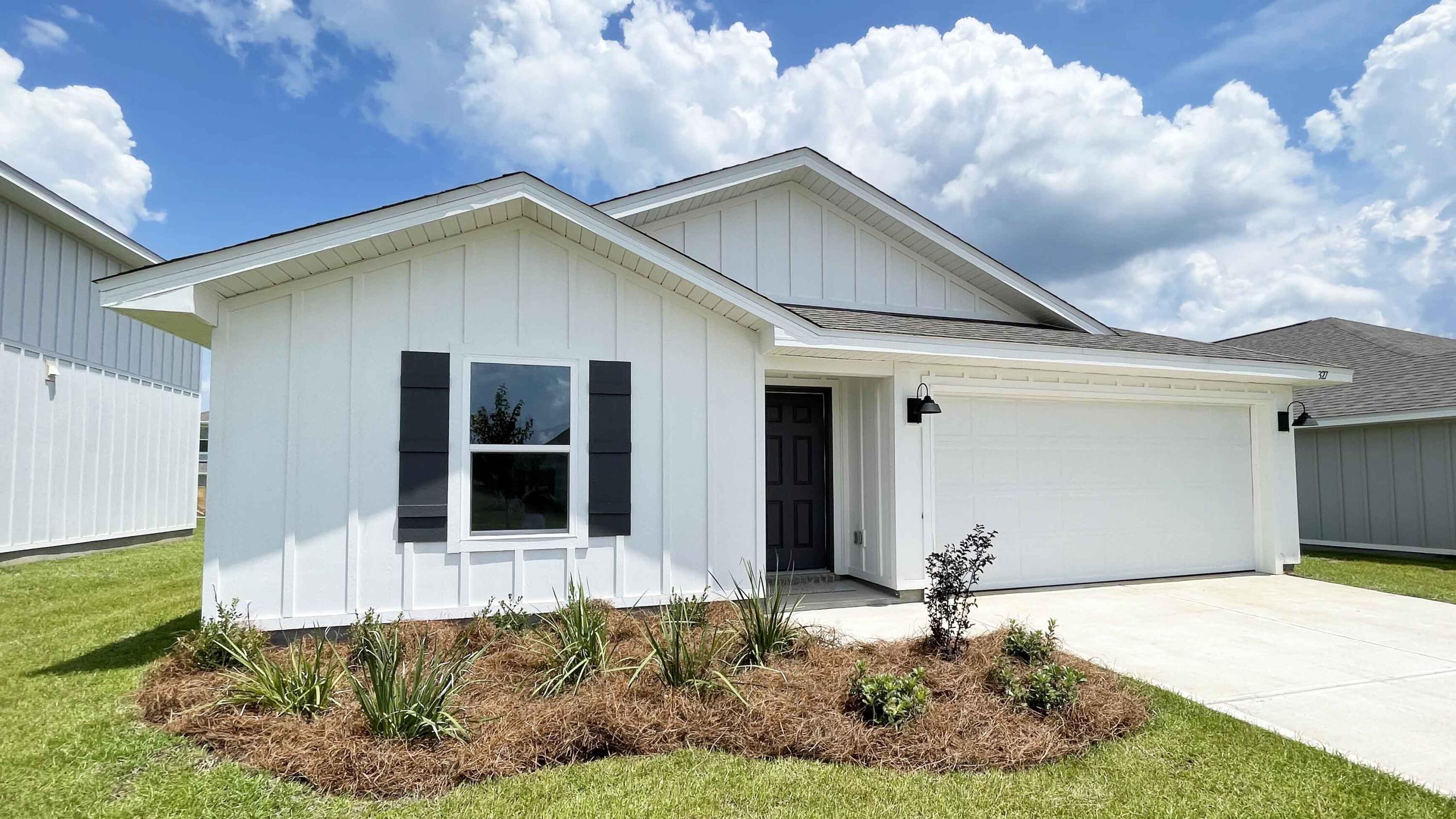 327 Flounder Street Crestview, FL 32539 - Photo 1 of 45 a house with trees in the background
