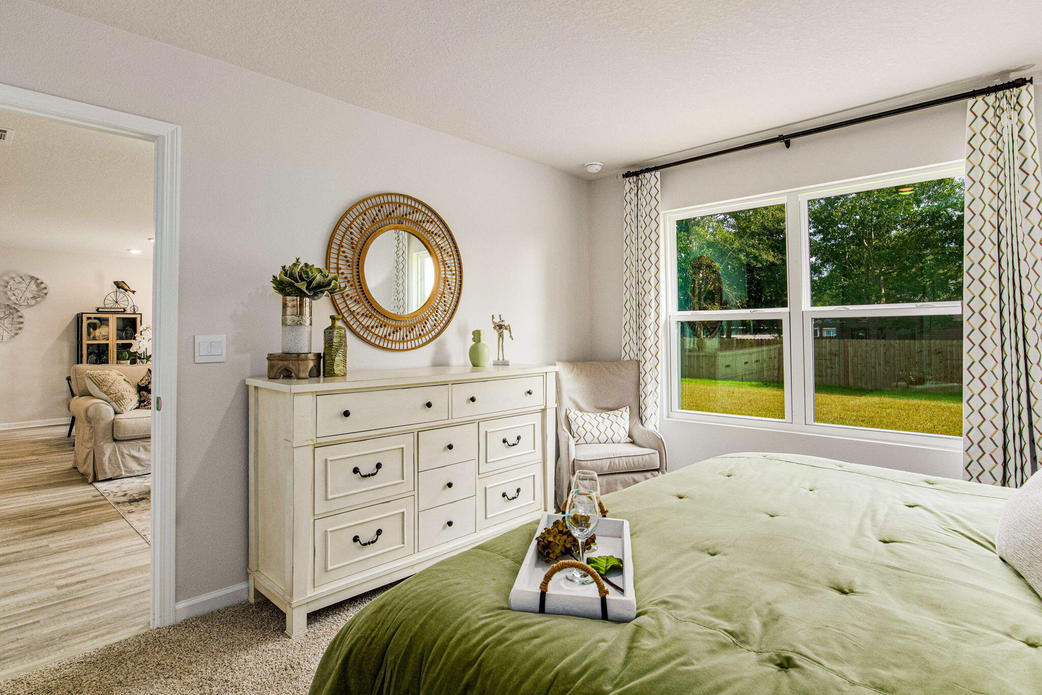327 Flounder Street Crestview, FL 32539 - Photo 14 of 45 a bedroom with a bed and a large window
