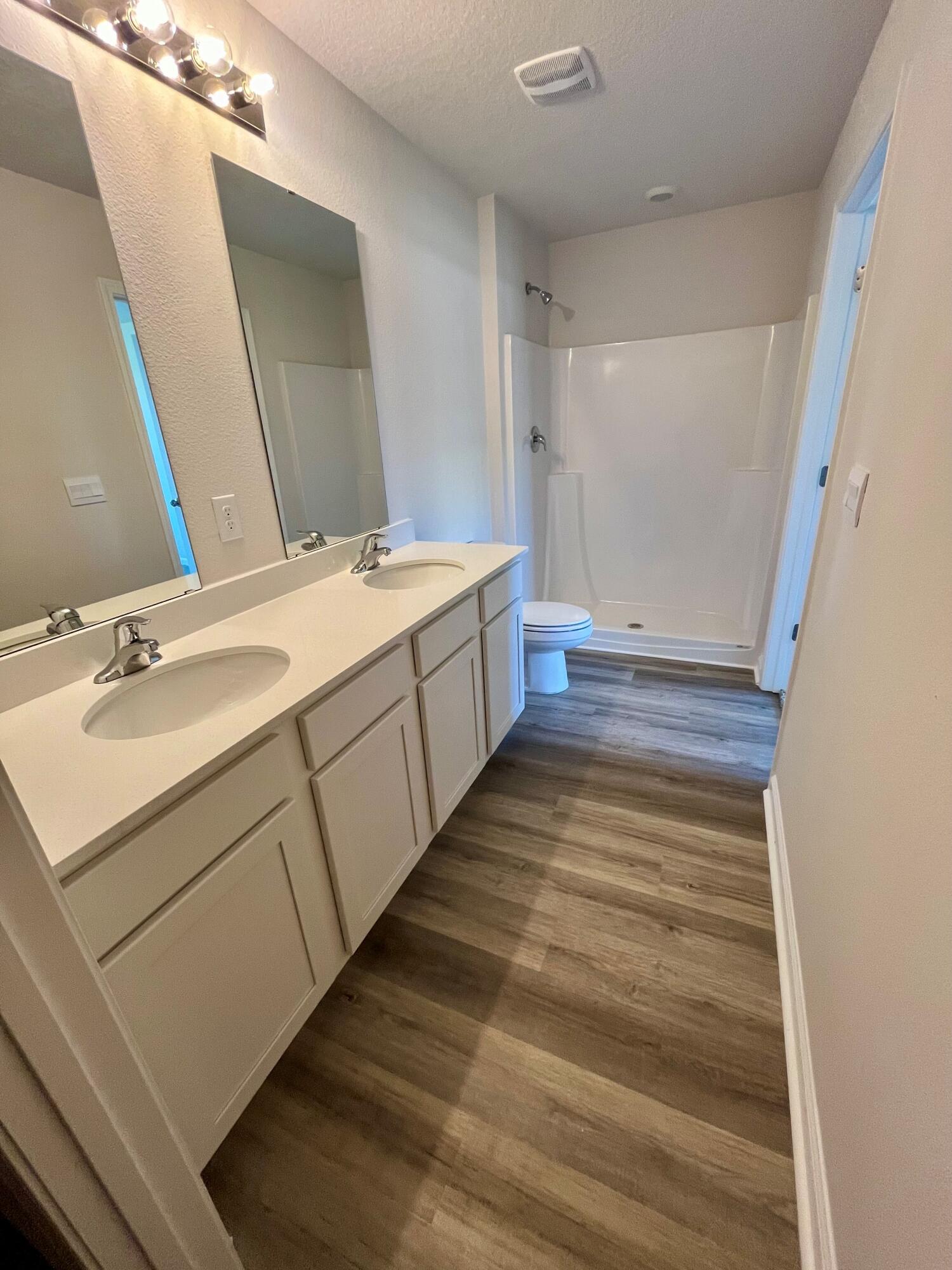 327 Flounder Street Crestview, FL 32539 - Photo 40 of 45 a bathroom with a sink and a mirror