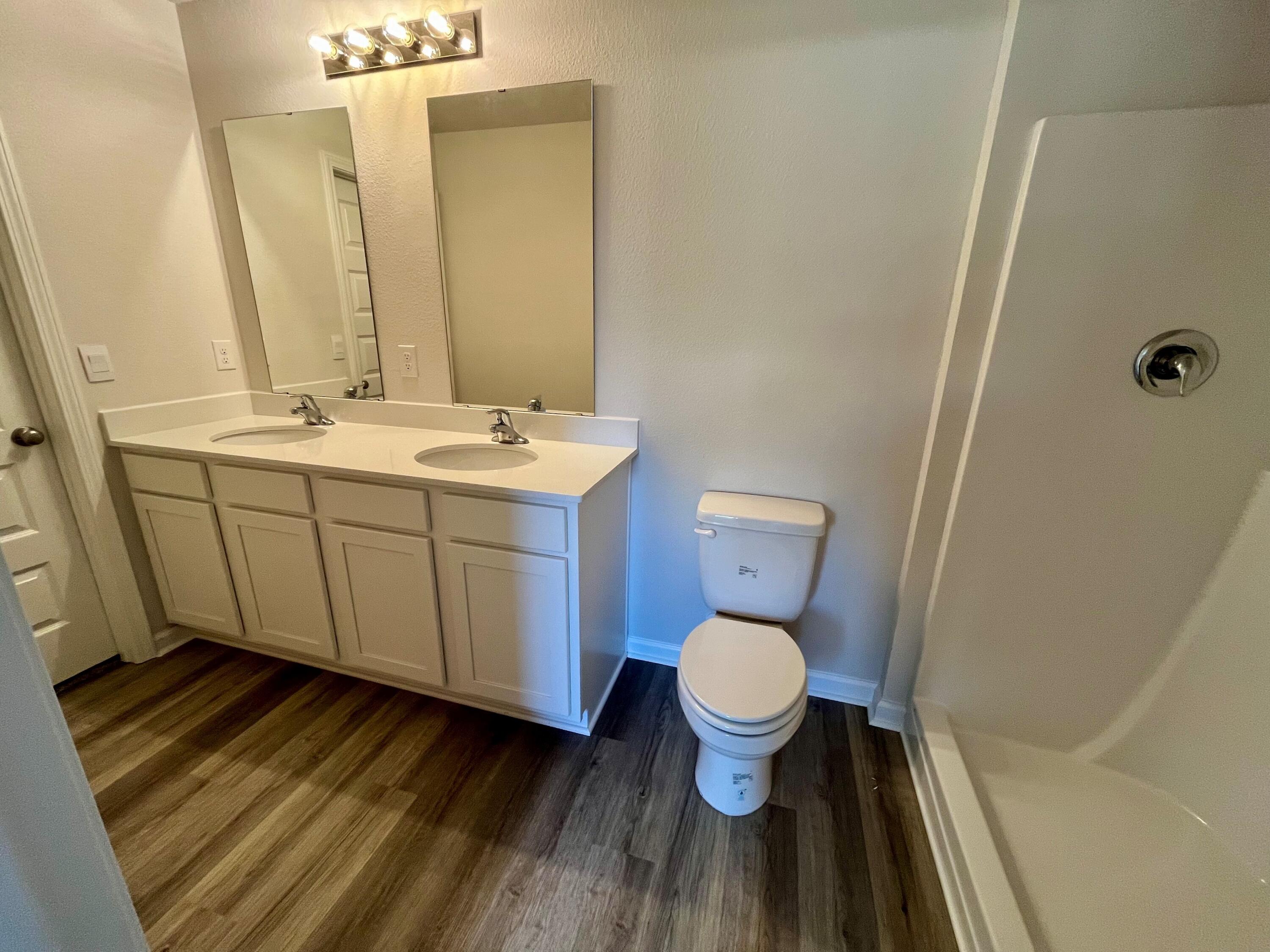 327 Flounder Street Crestview, FL 32539 - Photo 41 of 45 a bathroom with a sink and a mirror