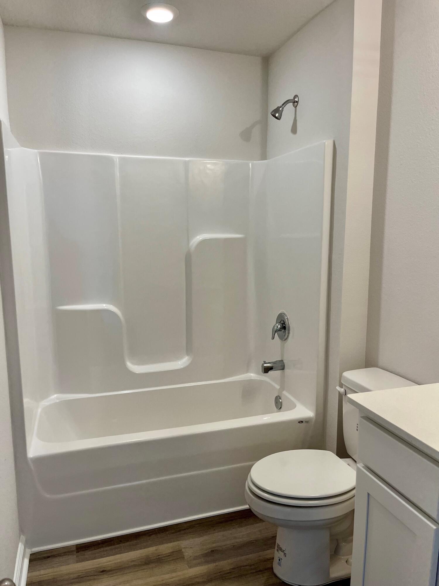 327 Flounder Street Crestview, FL 32539 - Photo 42 of 45 a bathroom with a toilet and a bathtub