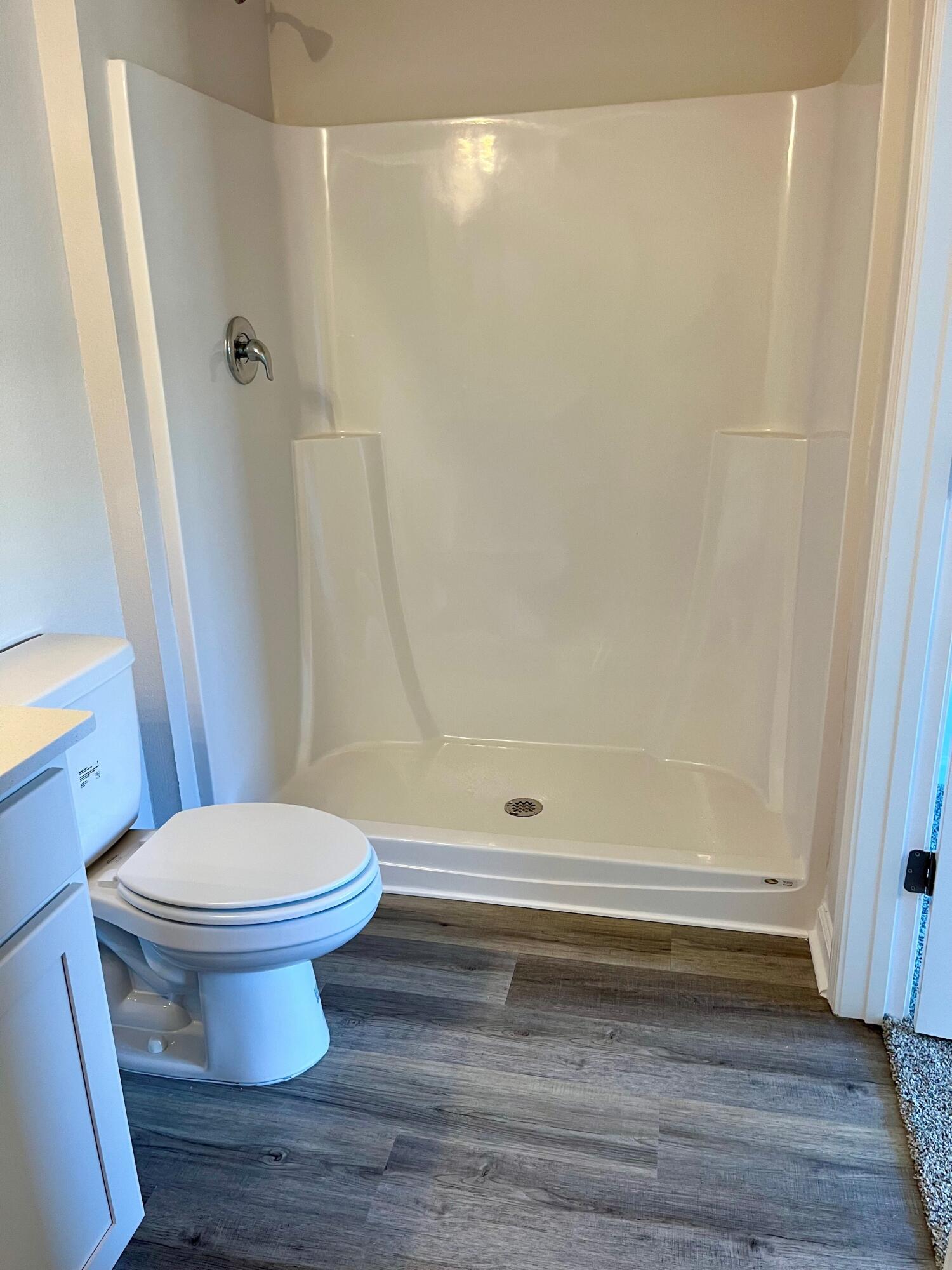 327 Flounder Street Crestview, FL 32539 - Photo 43 of 45 a bathroom with a toilet and a shower