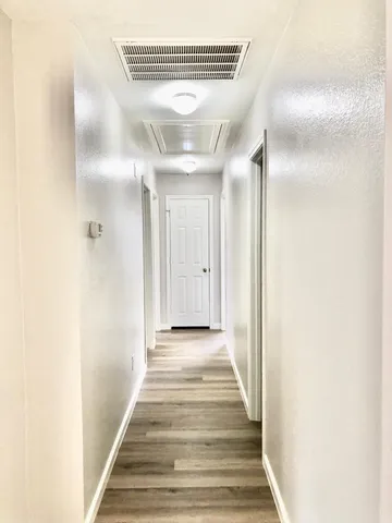 a view of kitchen with wooden floor