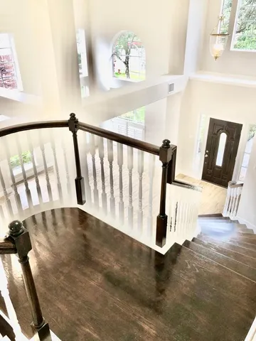 a view of a house with a yard and sitting area