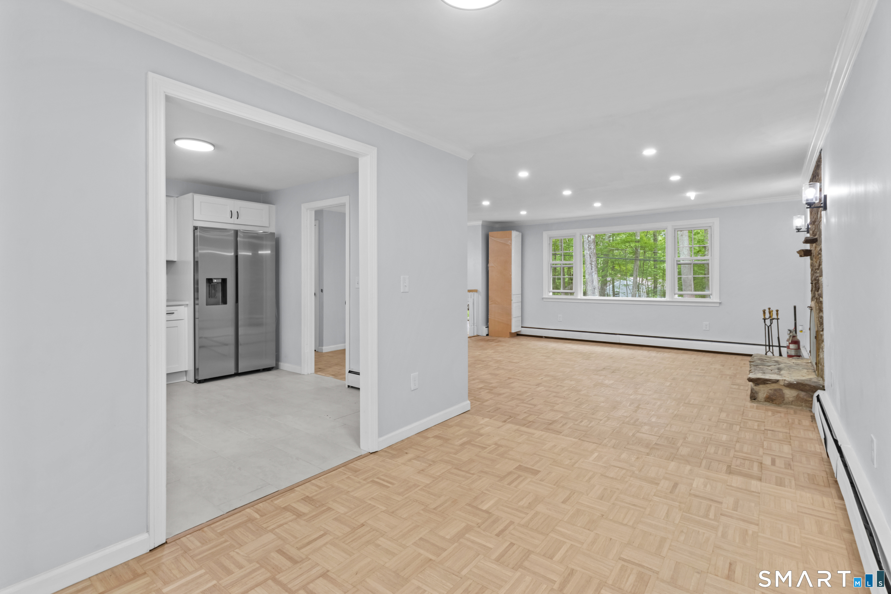 20 Quiet Woods Road East Hampton, CT 06424 - Photo 8 of 40 an empty room with windows and entrance
