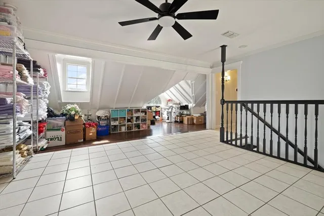 a bedroom with a bed and cabinets