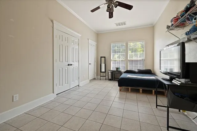 a view of a house with swimming pool and sitting area