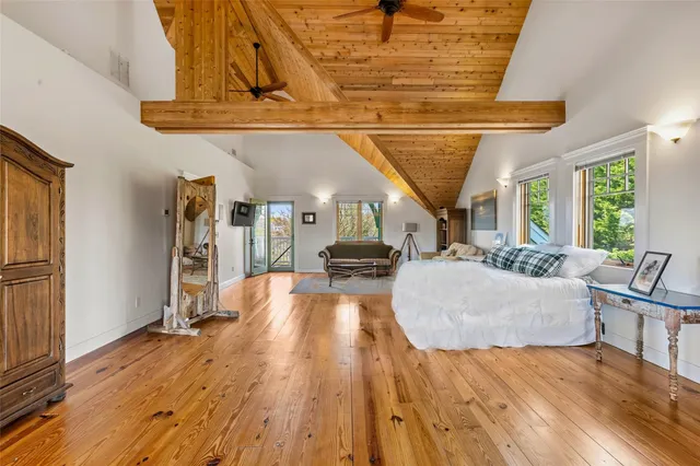 a view of a chairs and table in the balcony