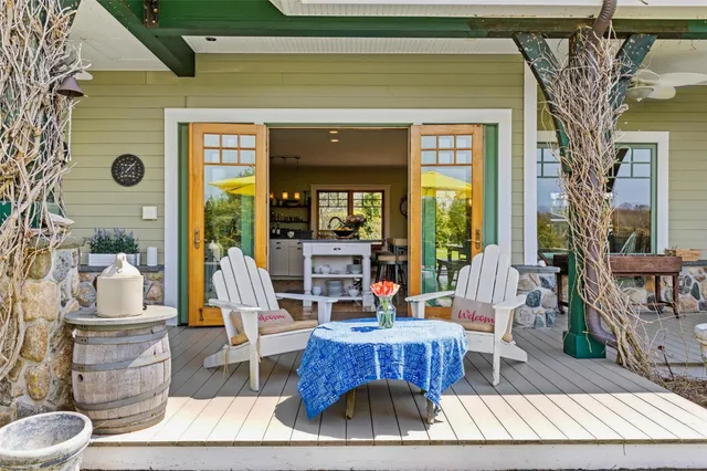 a view of living room filled with furniture and rug