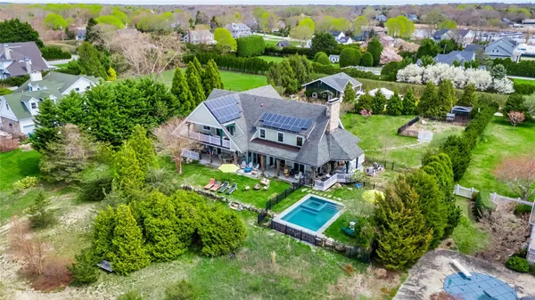 an aerial view of a house with a garden
