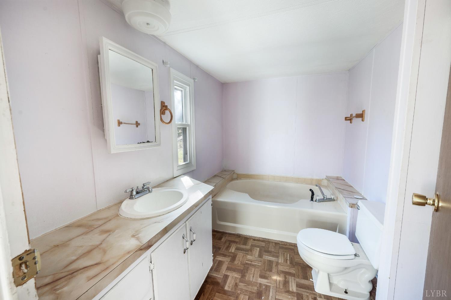 630 Eldon Road Appomattox, VA 24522 - Photo 14 of 37 a bathroom with a sink toilet tub and vanity