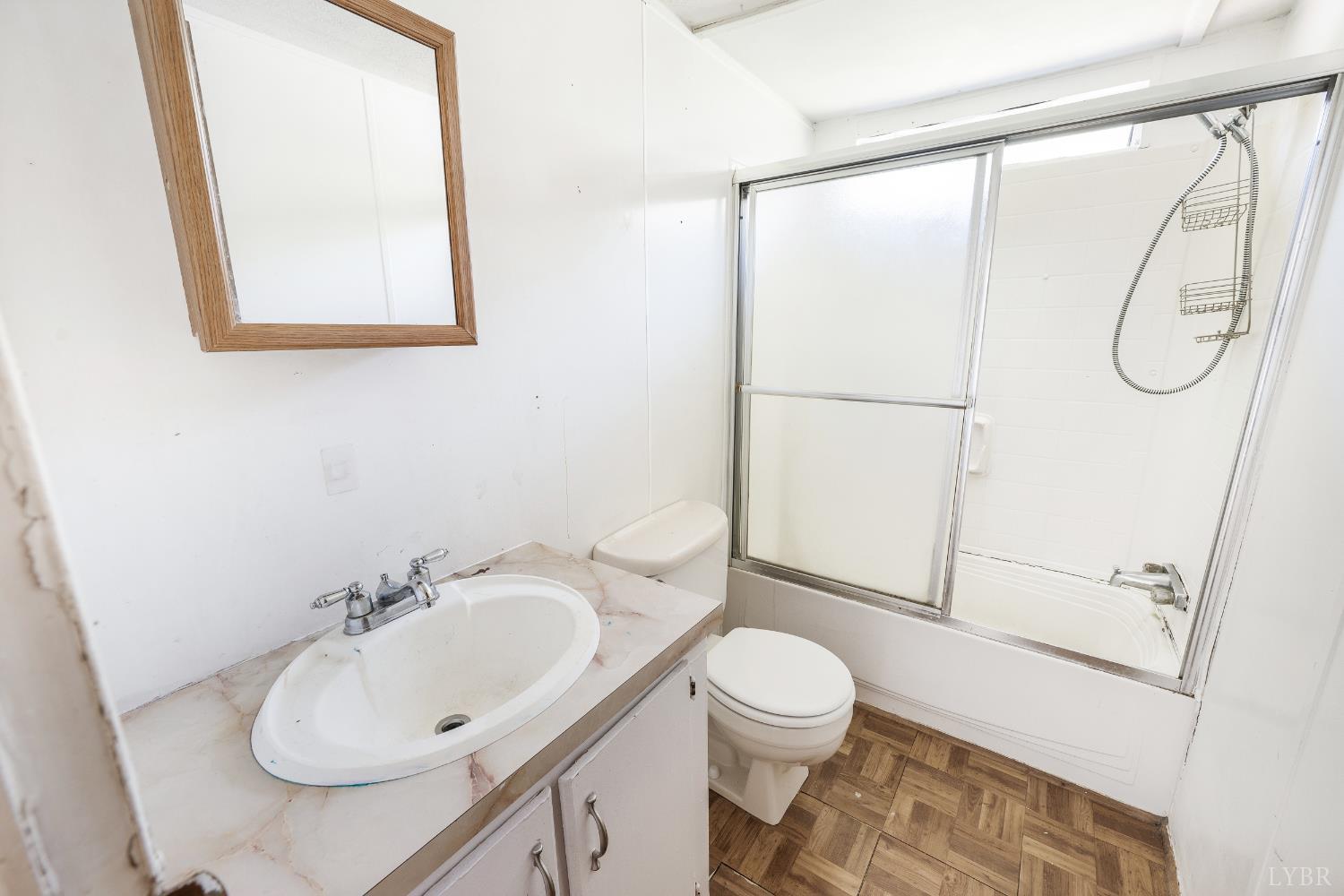 630 Eldon Road Appomattox, VA 24522 - Photo 23 of 37 a bathroom with a sink toilet and shower