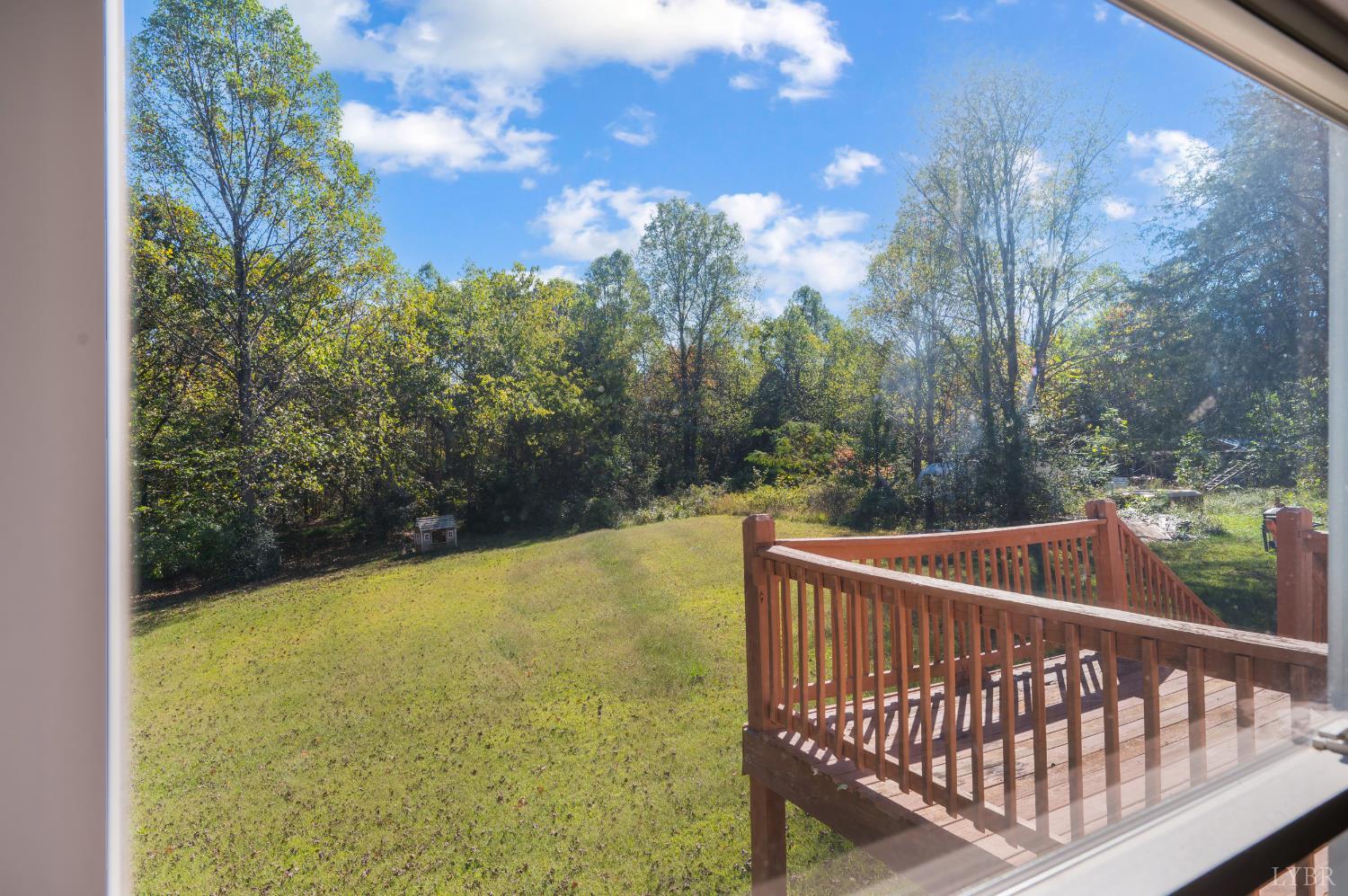 630 Eldon Road Appomattox, VA 24522 - Photo 24 of 37 a view of a balcony with trees