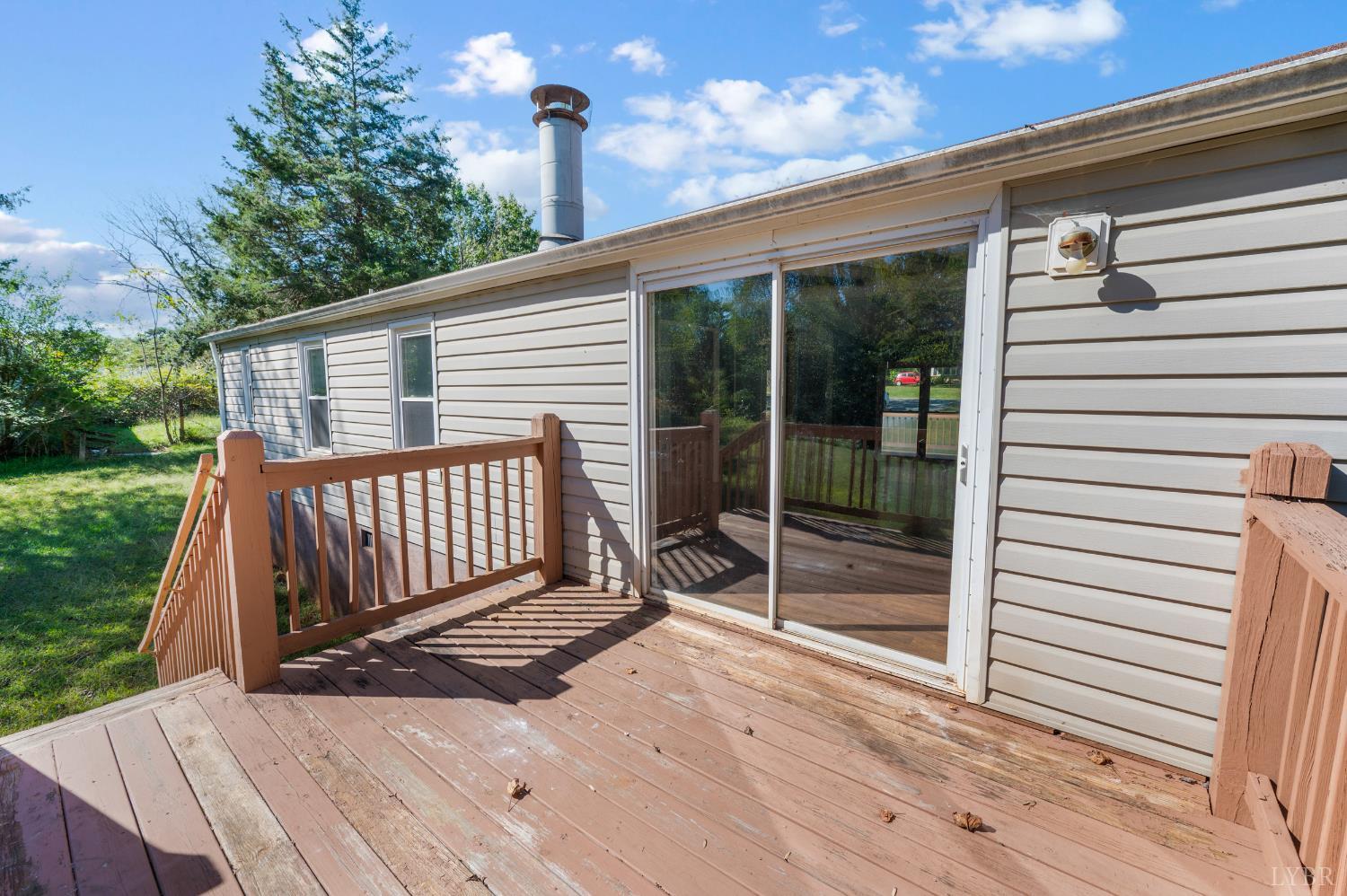 630 Eldon Road Appomattox, VA 24522 - Photo 26 of 37 a view of a backyard with a deck