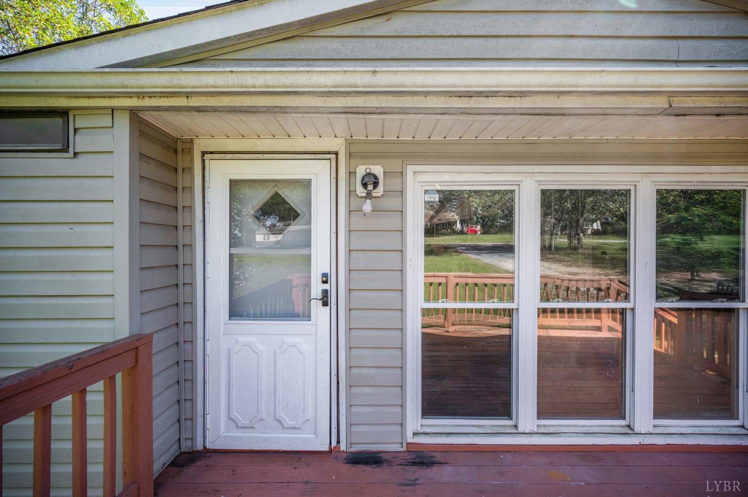 630 Eldon Road Appomattox, VA 24522 - Photo 3 of 37 a front view of a house with a glass door