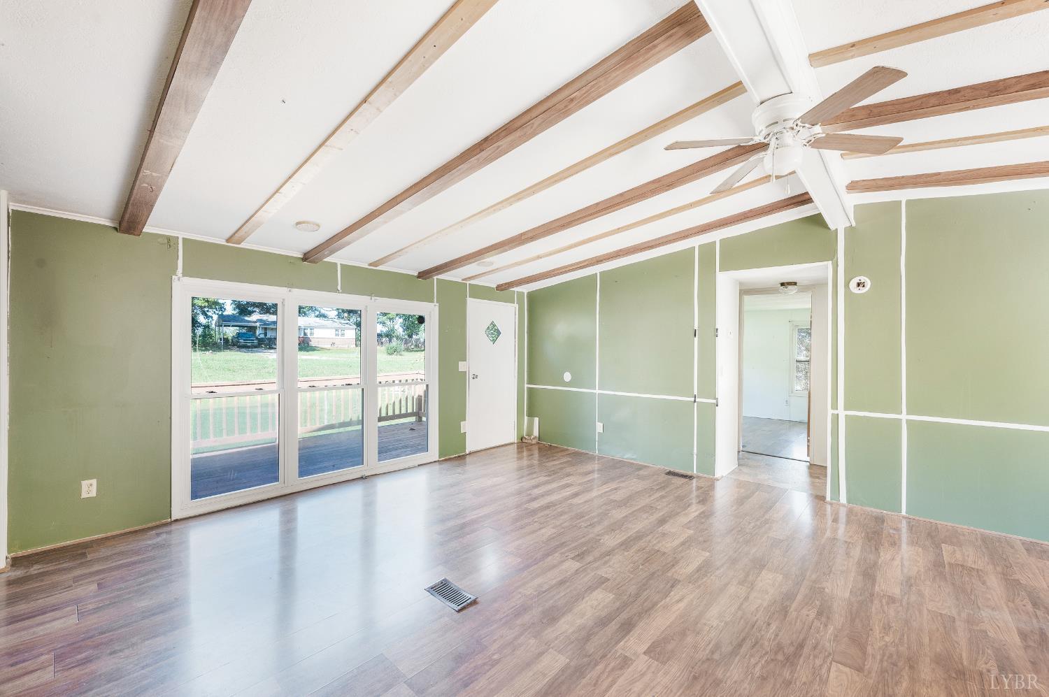 630 Eldon Road Appomattox, VA 24522 - Photo 5 of 37 wooden floor in an empty room with a window