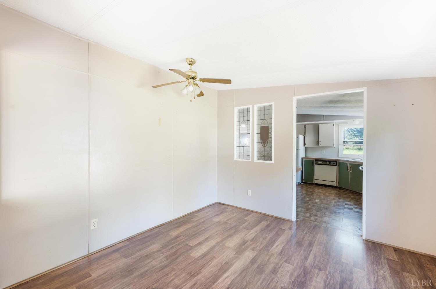 630 Eldon Road Appomattox, VA 24522 - Photo 8 of 37 a view of a room with wooden floor and bathroom